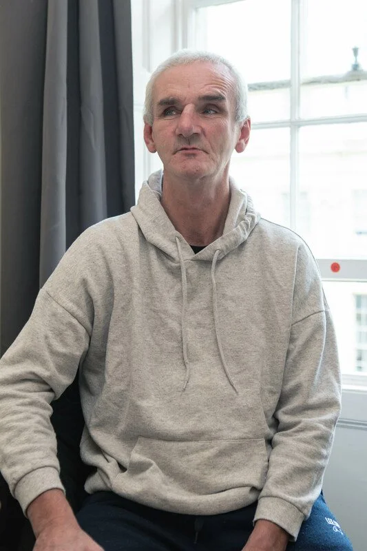 Portrait of a person affected by homelessness